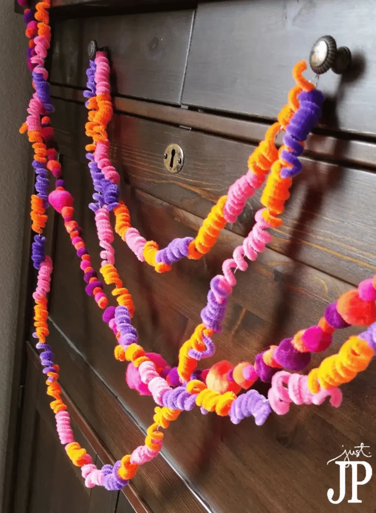 Pom pom and pipe cleaners garland