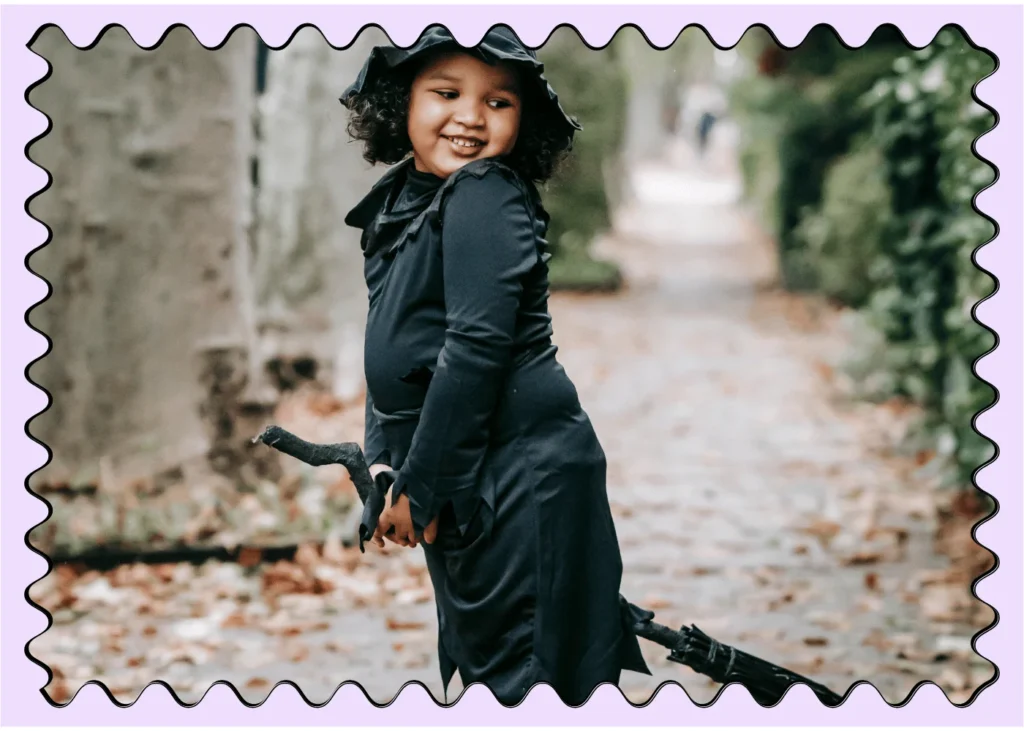 happy child on a 'witches' broomstick. Halloween party ideas for kids
